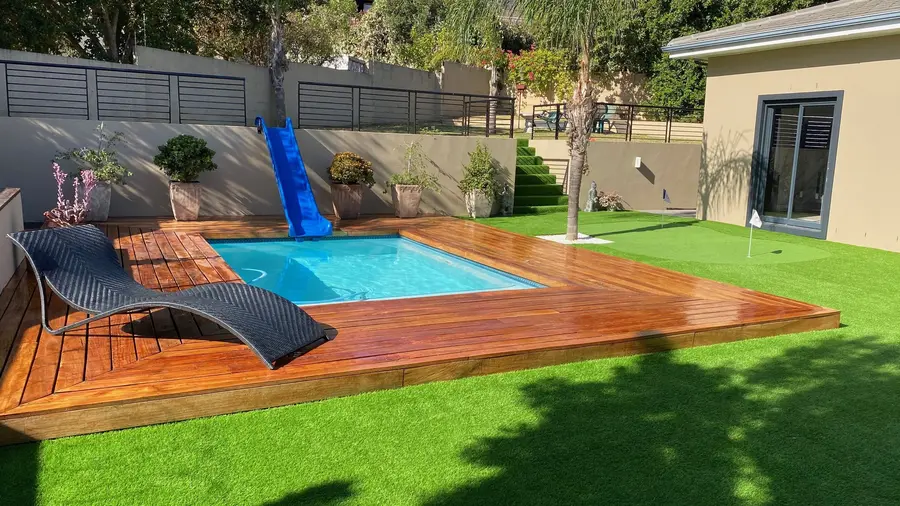 Kirkia Street home with a timber deck and pool