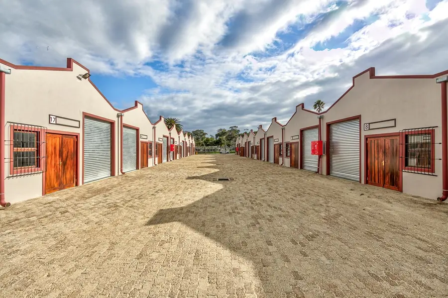 Rows of factory units with timber doors at Platinum Park